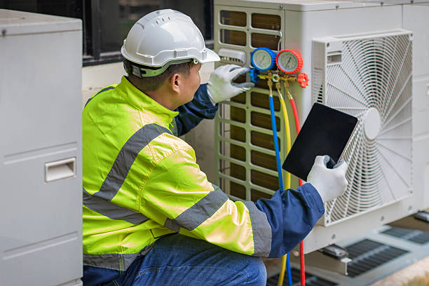 Professional Air Duct Cleaning technician working in Auburn, NY